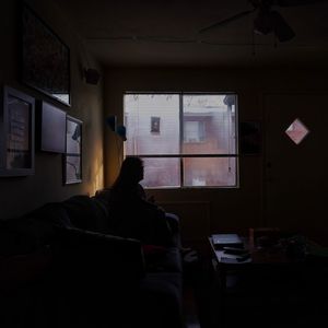 Man sitting in window