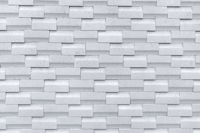 White brick wall with simple pattern. white wall texture abstract background. modern design of wall.
