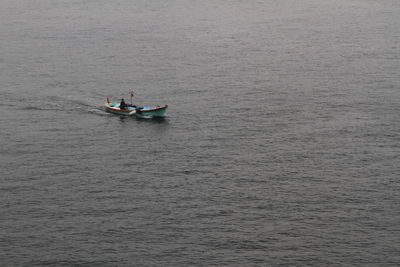 Boat sailing in sea