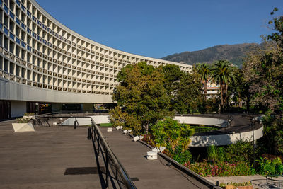 View of street and buildings against sky