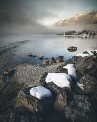 Scenic view of sea shore against sky