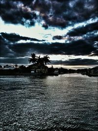 Scenic view of sea against cloudy sky