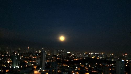 Illuminated cityscape at night