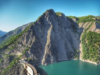 Panoramic view of rock formations against sky