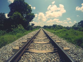 Railroad track against sky