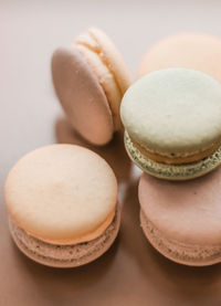 Close-up of macaroons on white background