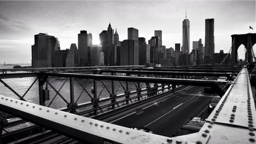 City skyline seen through brooklyn bridge