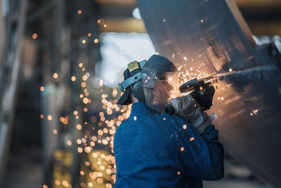 Portrait of man working at night