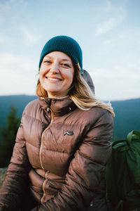 Portrait of a smiling young woman in winter