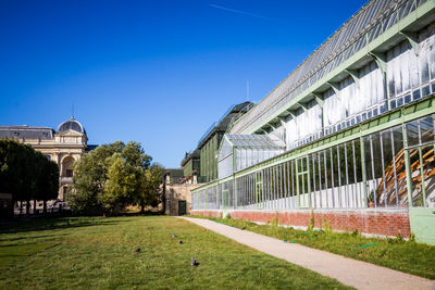 View of buildings against blue sky