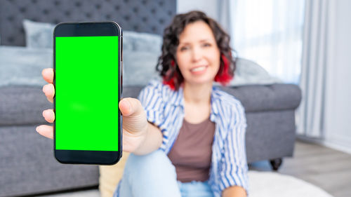 Young woman using mobile phone