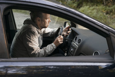 Man driving car