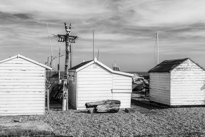 Beach huts against sky