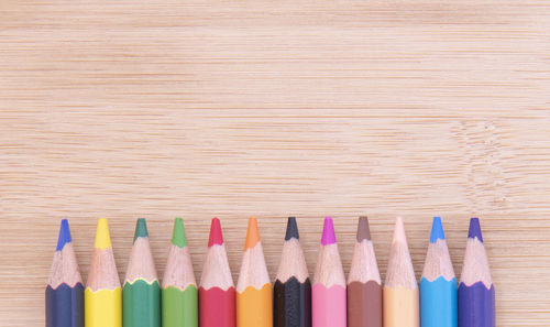 High angle view of multi colored pencils on table