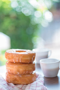 Close-up of donuts served on table