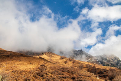 Scenic view of mountains against sky