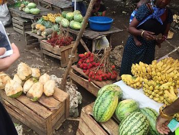 Man preparing food for sale at market stall