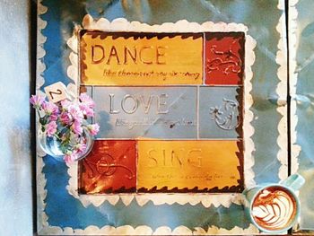 Close-up of text on wall