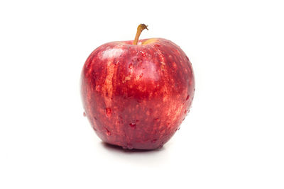 Close-up of apple against white background