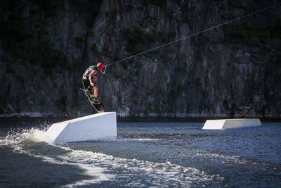 Wakeboarding man, jumping - extreme sport