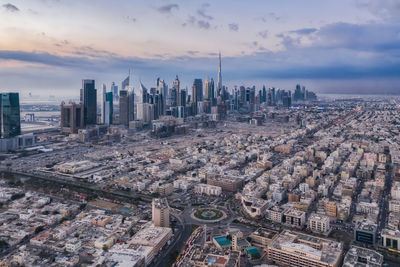 View of cityscape against sky during sunset