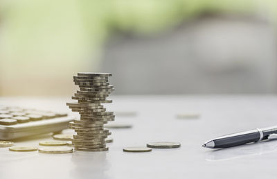 Close-up of coins on table