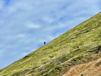 Low angle view of man against sky