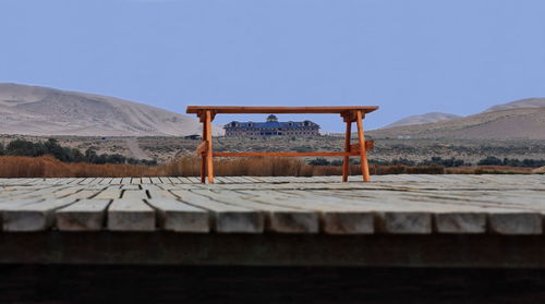 1050 yellow bench table-wood boardwalk-lake badain e. badain jaran area gobi desert-nei mongol-china