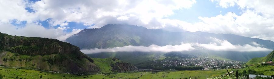 Panoramic view of mountains against sky