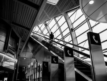 Low angle view of man on staircase