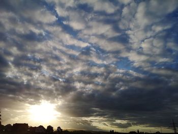 Low angle view of cloudy sky during sunset