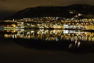 View of illuminated lake at night