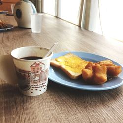 Close-up of breakfast served on table