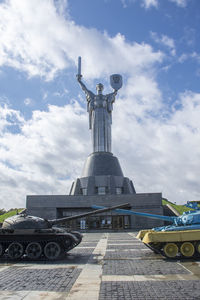 Low angle view of statue against sky