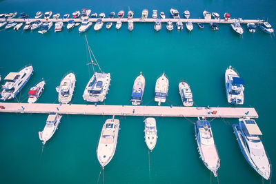 Aerial view of boats and yachts moored to jetty. yachts in marina