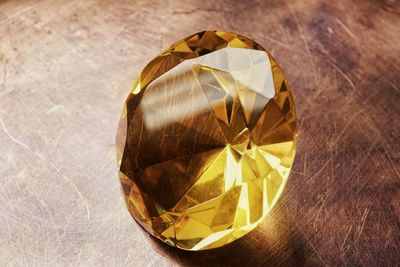 Close-up of gemstone on table