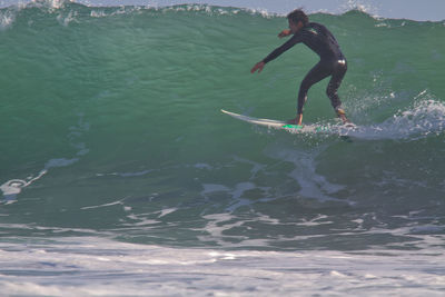 Man surfing in sea