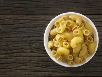 Close-up of macaroni pasta on table