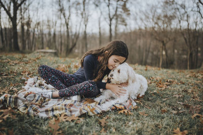 Portrait of a dog lying on land