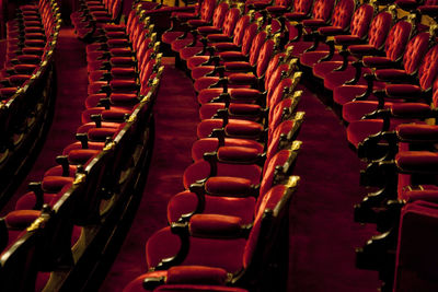 High angle view of velvet armchairs at theater