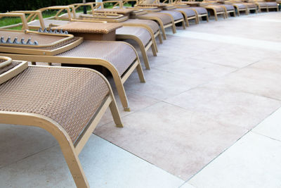 High angle view of chairs on table