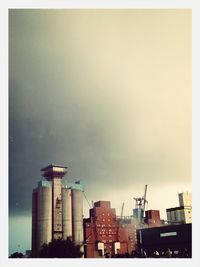 Construction site with buildings in background