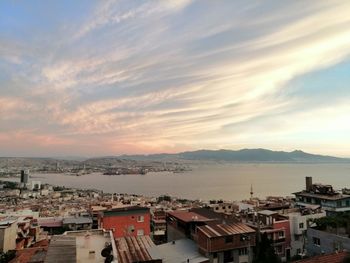 High angle shot of townscape against sky during sunset