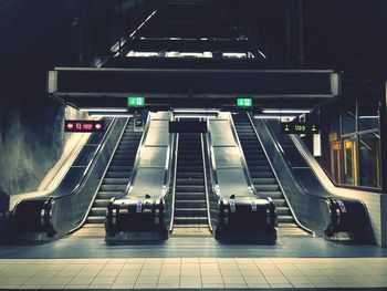 Low angle view of escalators at railroad station