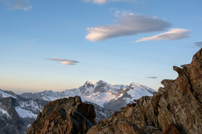 Sunrise view of the monte rosa group and strahlhorn, swiss alps, seen from weissmies, switzerland.