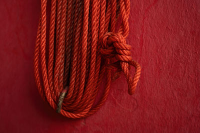 Close-up of rope tied on wall