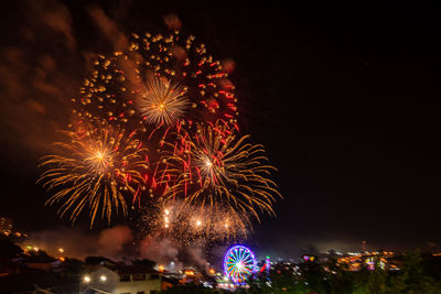 Firework display at night