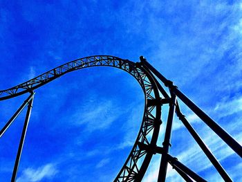 Low angle view of rollercoaster against sky