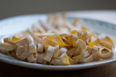 Close-up of fettuccine pasta in plate