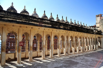 Exterior of historic building against clear sky